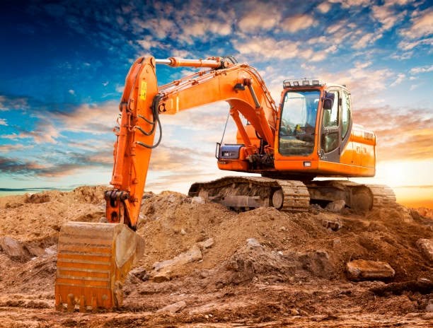Excavator at an active demolition and site preparation project in Surrey BC